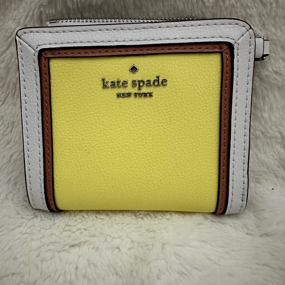 Brand new without tags Kate Spade Yellow and White Wallet
